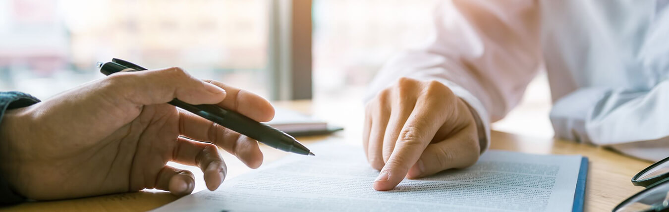 image of hands reviewing sba document